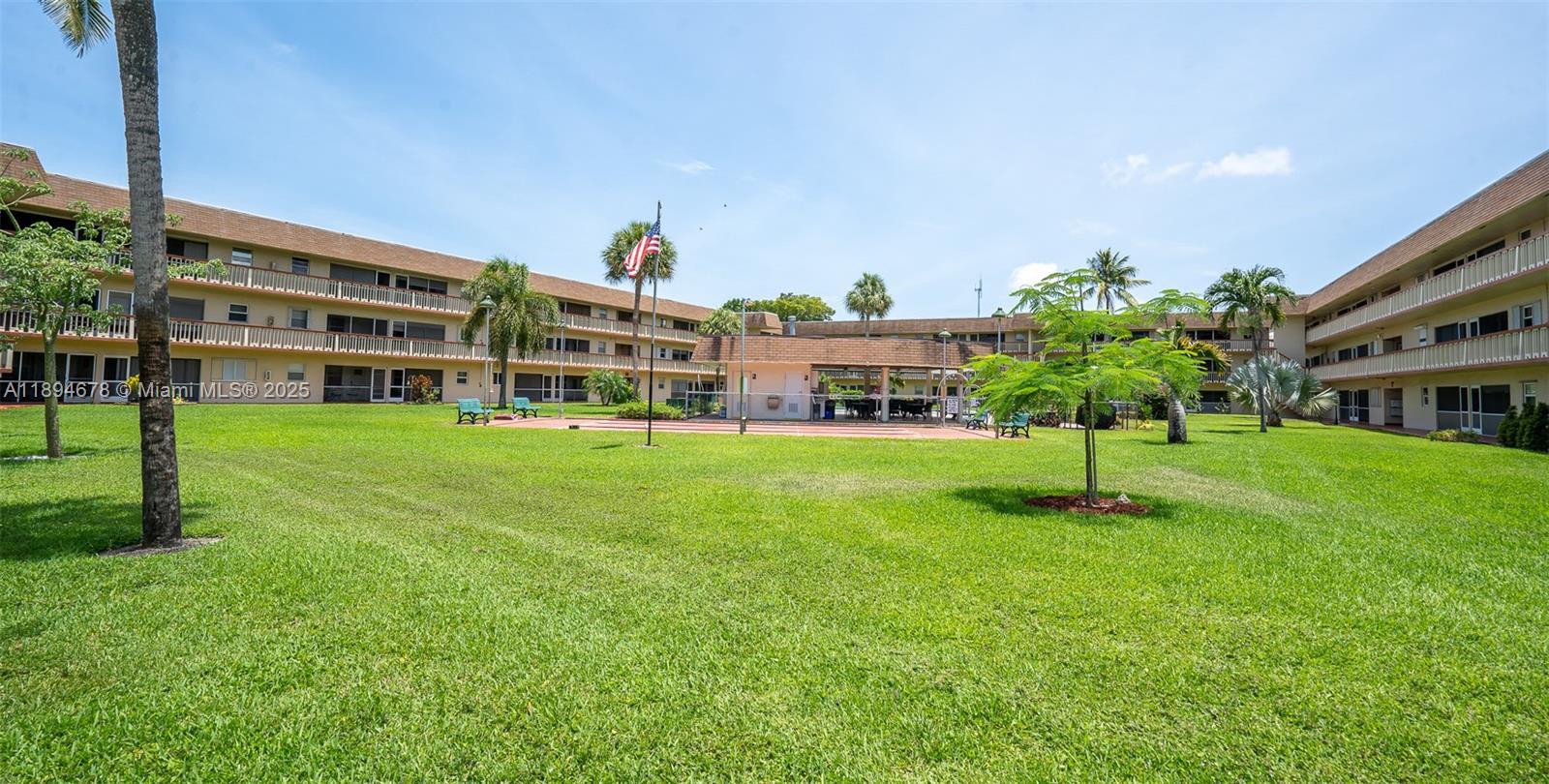 5300 Washington Street, Unit T227 Hollywood, FL 33021 - Photo 38 of 45 a view of a house with a yard