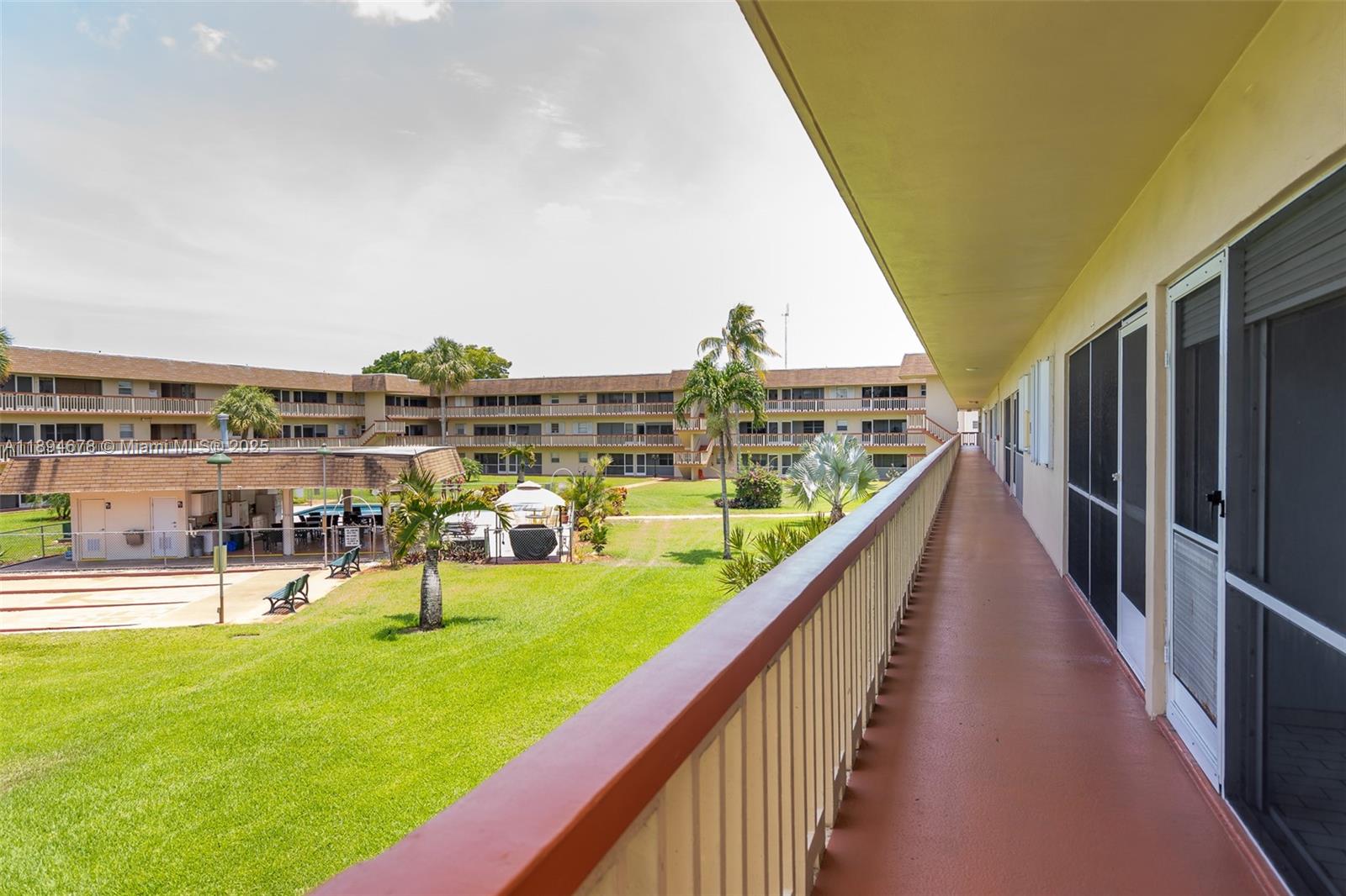 5300 Washington Street, Unit T227 Hollywood, FL 33021 - Photo 4 of 45 a view of a swimming pool with seating area