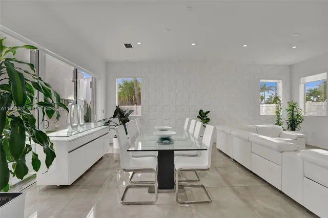 a view of a house with swimming pool porch and furniture