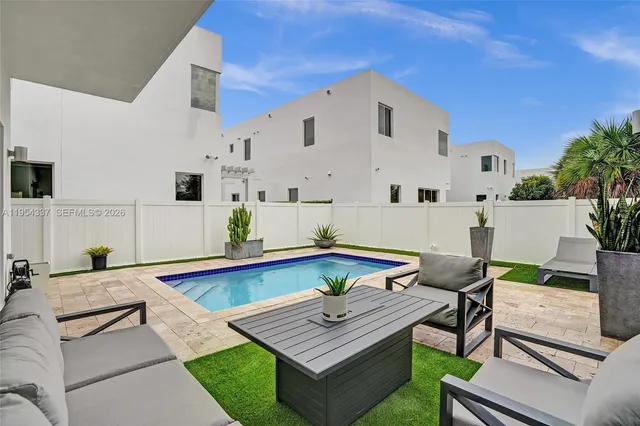 a workspace with furniture and wooden floor