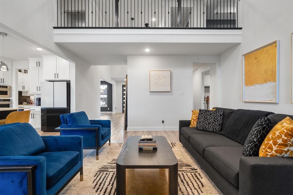 1308 Redbrick Lane Northlake, TX 76247 - Photo 11 of 40 a living room with furniture and a window