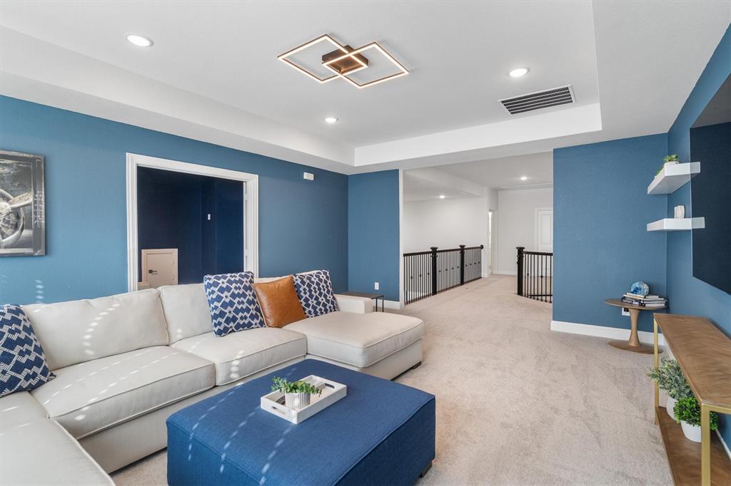 1308 Redbrick Lane Northlake, TX 76247 - Photo 26 of 40 a living room with furniture and a lamp