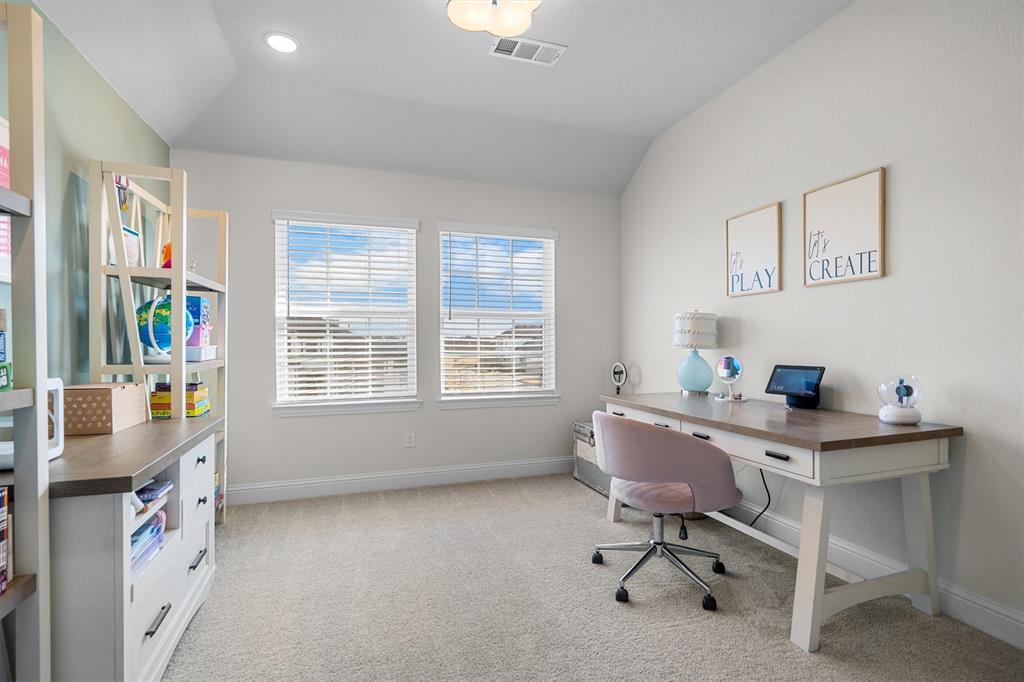 1308 Redbrick Lane Northlake, TX 76247 - Photo 30 of 40 a view of a workspace with furniture and a window