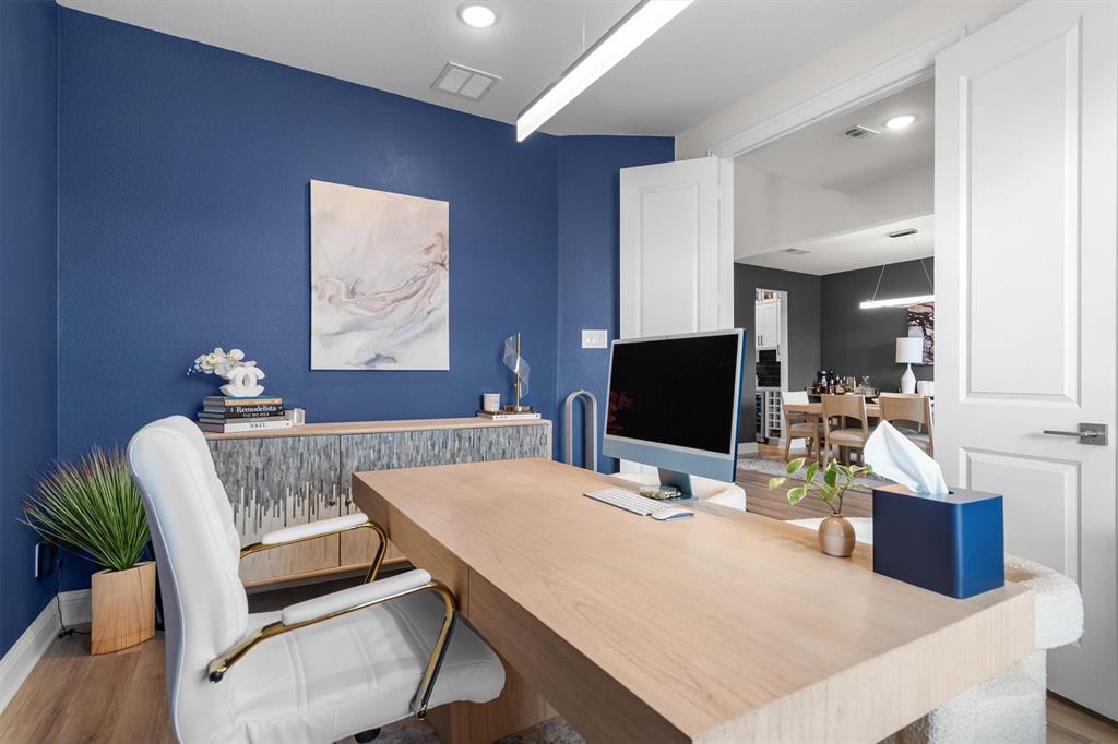 1308 Redbrick Lane Northlake, TX 76247 - Photo 9 of 40 a living room with furniture and a flat screen tv
