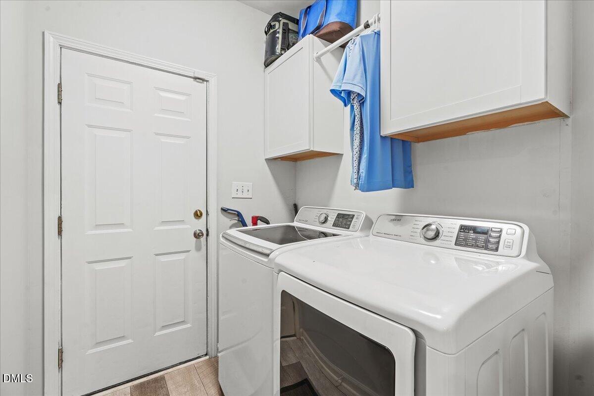 3331 Swinford Court Raleigh, NC 27604 - Photo 19 of 27 a utility room with dryer and washer