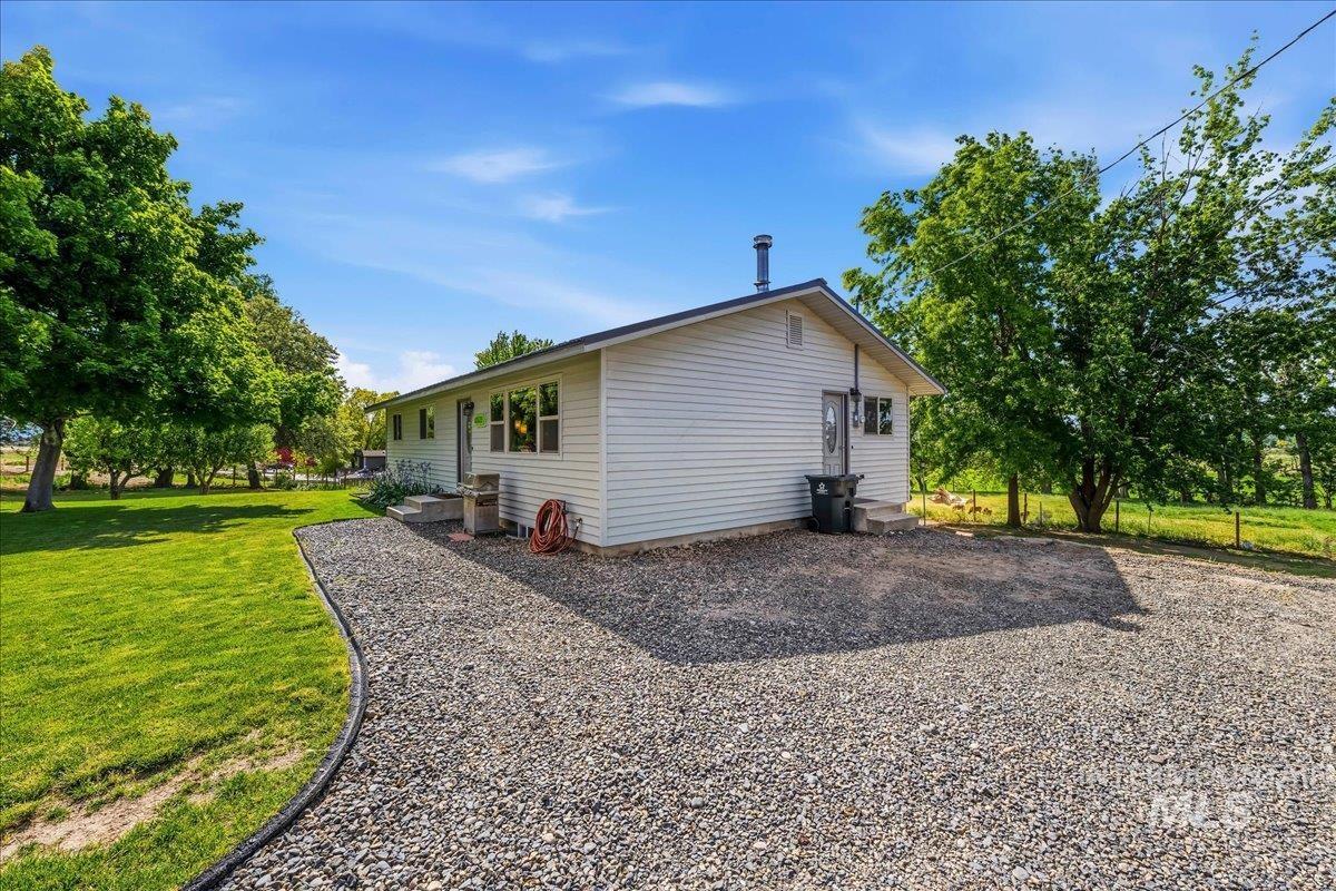 6323 Foothill Road Star, ID 83669 - Photo 36 of 50 Single-story residence featuring white siding and a dark roof