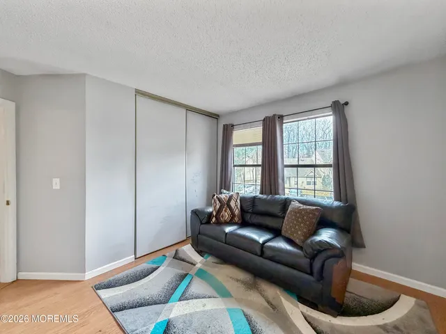 a spacious bathroom with a toilet sink and shower