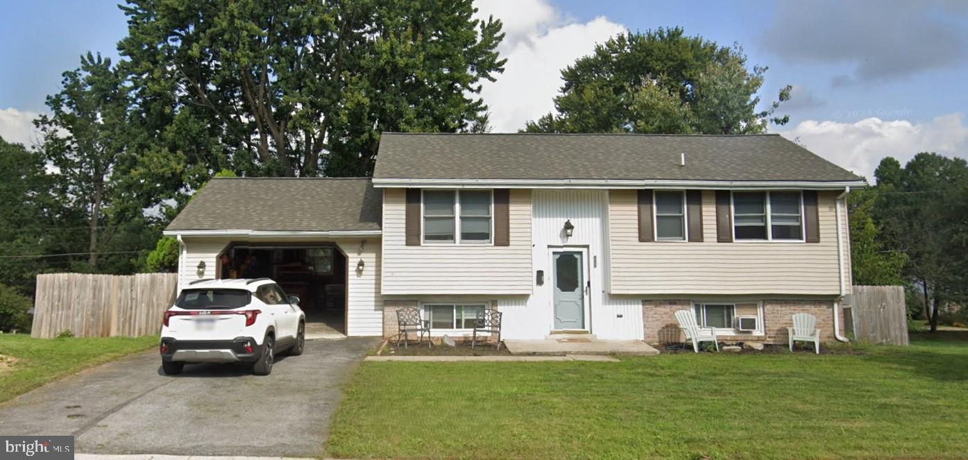 111 Oxford Drive Lititz, PA 17543 - Photo 2 of 33 a car parked in front of white house