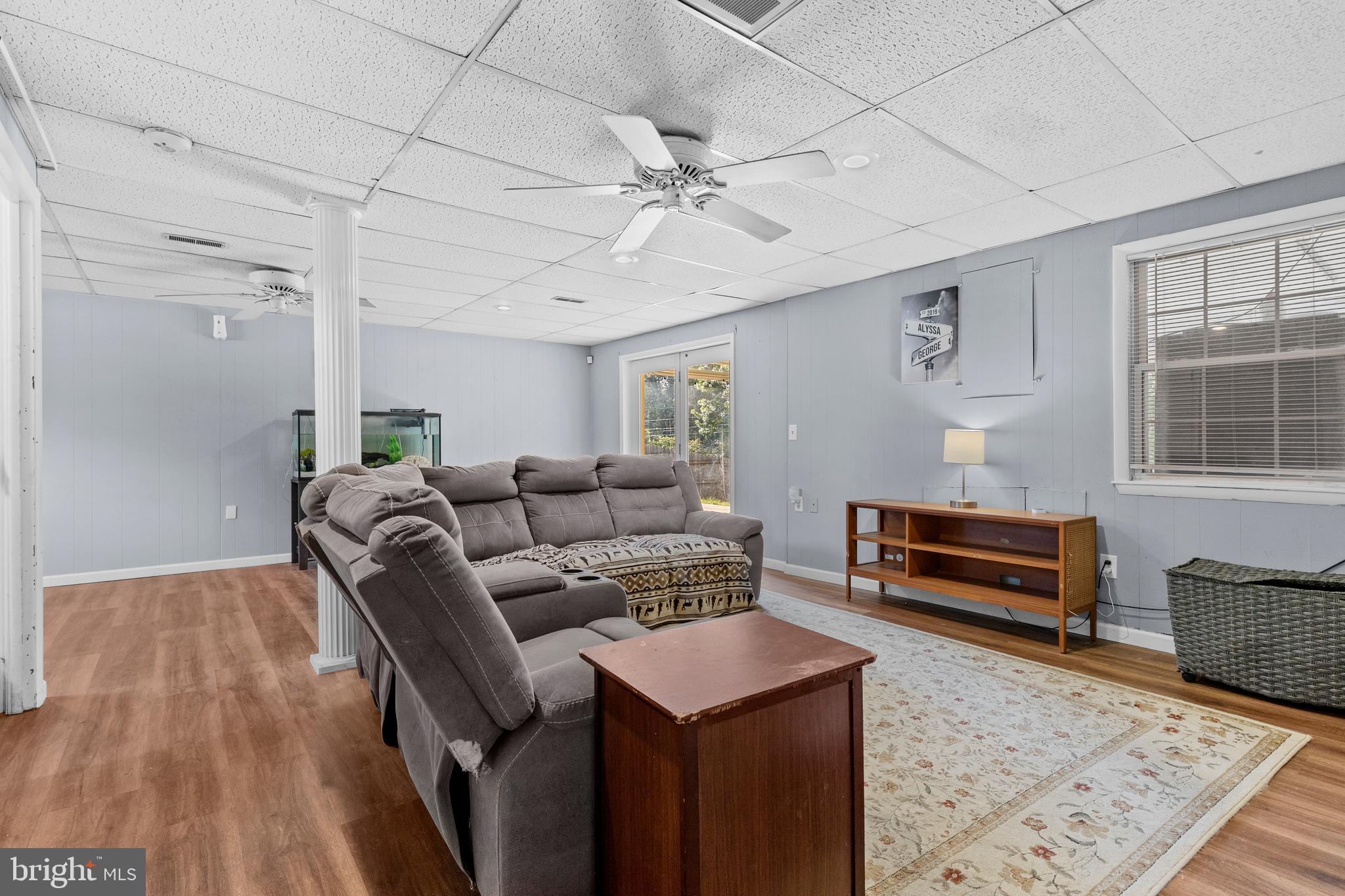 111 Oxford Drive Lititz, PA 17543 - Photo 22 of 33 a living room with furniture and a wooden floor