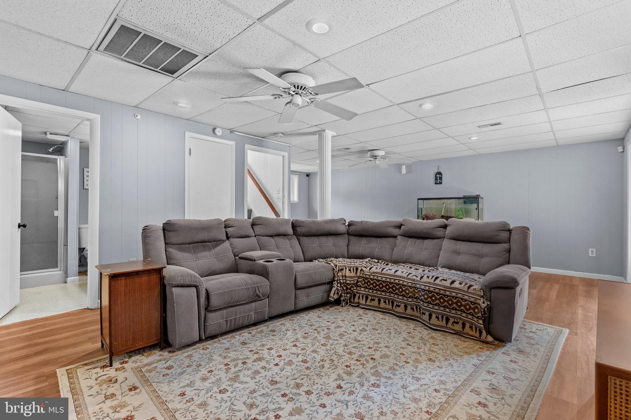 111 Oxford Drive Lititz, PA 17543 - Photo 23 of 33 a living room with furniture and a flat screen tv