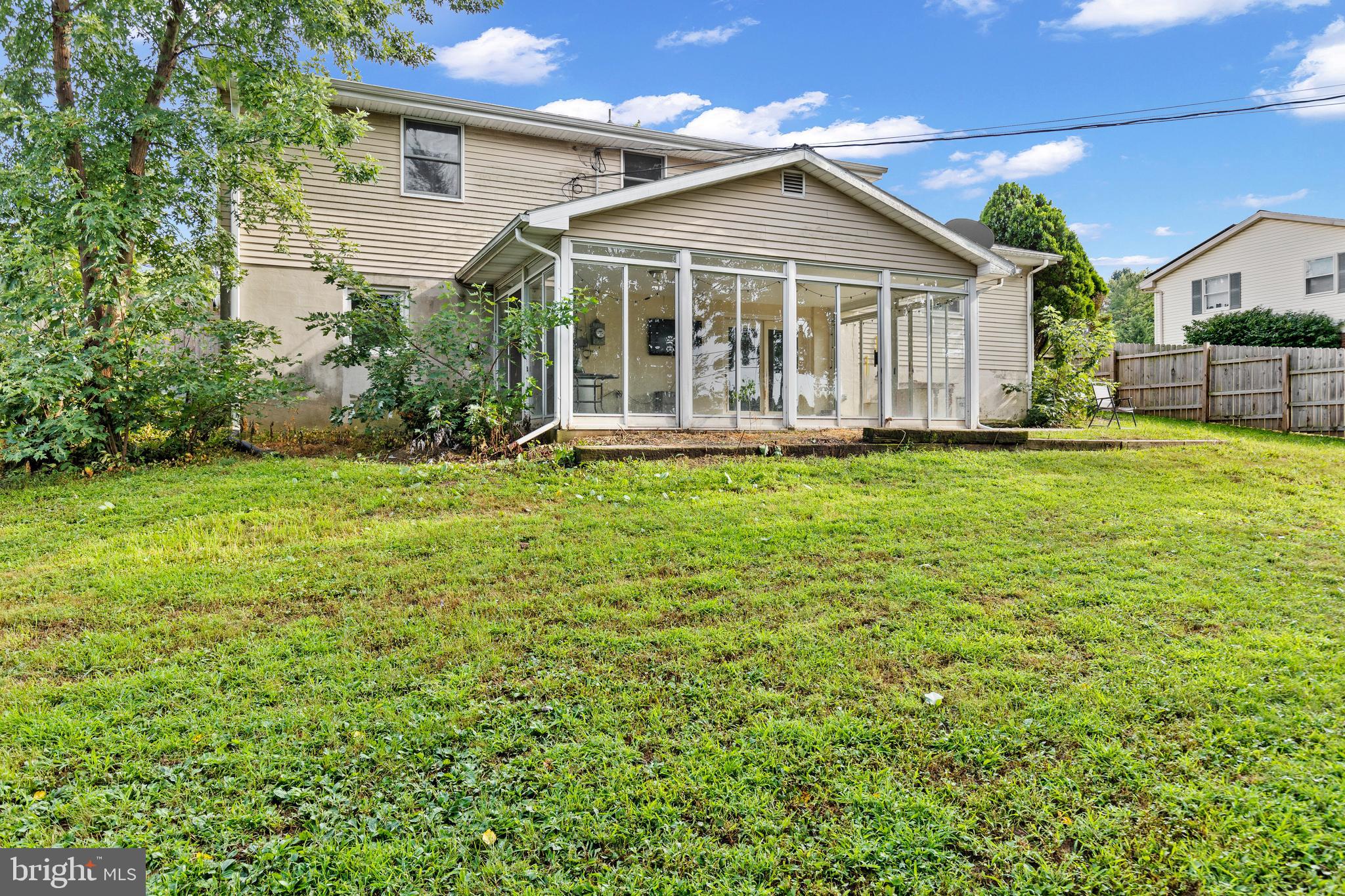 111 Oxford Drive Lititz, PA 17543 - Photo 32 of 33 a view of a house with a yard and sitting area