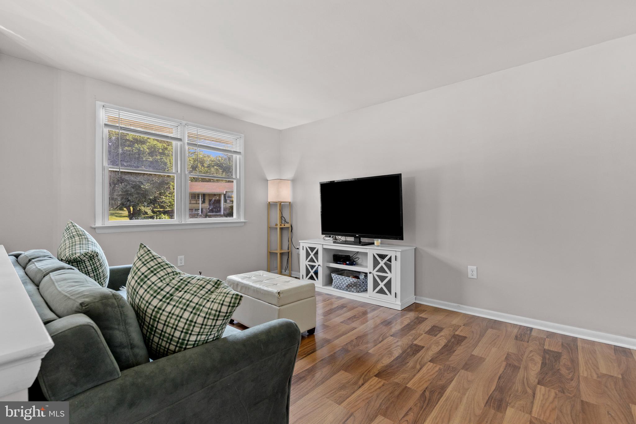 111 Oxford Drive Lititz, PA 17543 - Photo 8 of 33 a living room with furniture and a flat screen tv