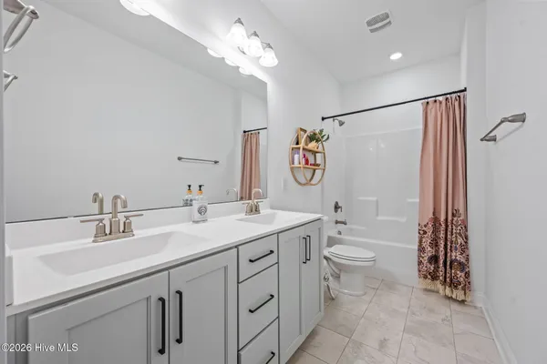 $515,000 | 105 East Yellow Lois Drive, Hampstead, NC 28443