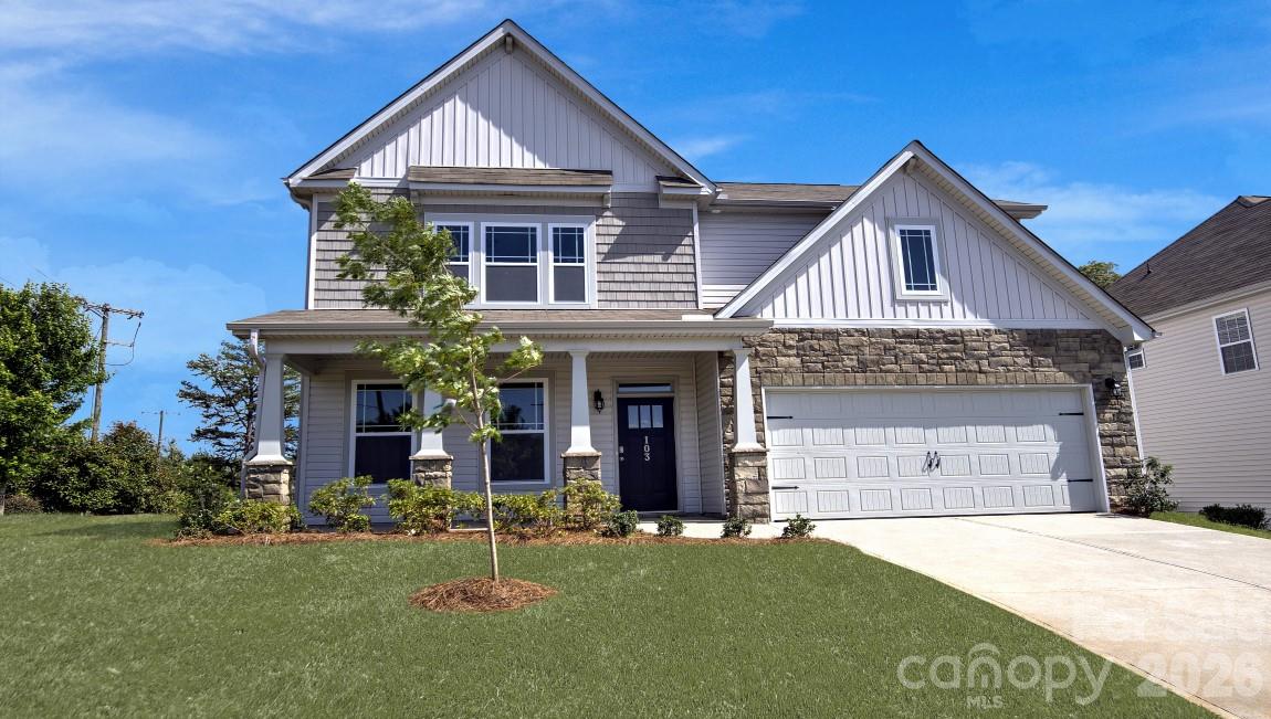 505 River Btm Road Fletcher, NC 28732 - Photo 1 of 20 a front view of a house with a yard and garage