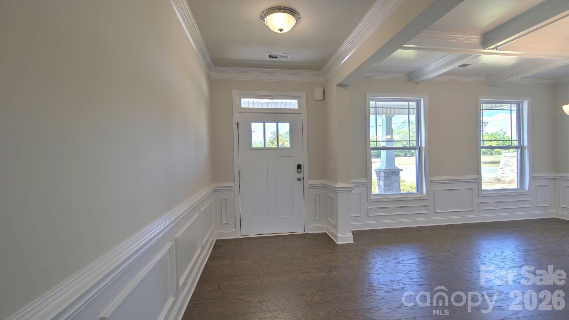 505 River Btm Road Fletcher, NC 28732 - Photo 5 of 20 an empty room with wooden floor and windows