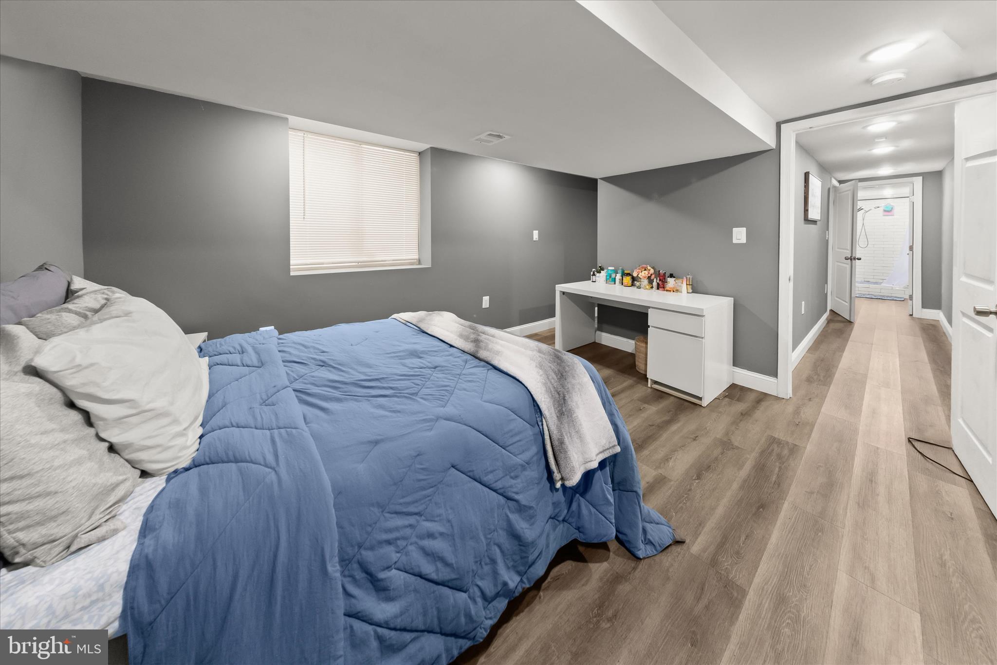 10712 Gainsborough Road Potomac, MD 20854 - Photo 37 of 53 a bedroom with a bed and a large mirror