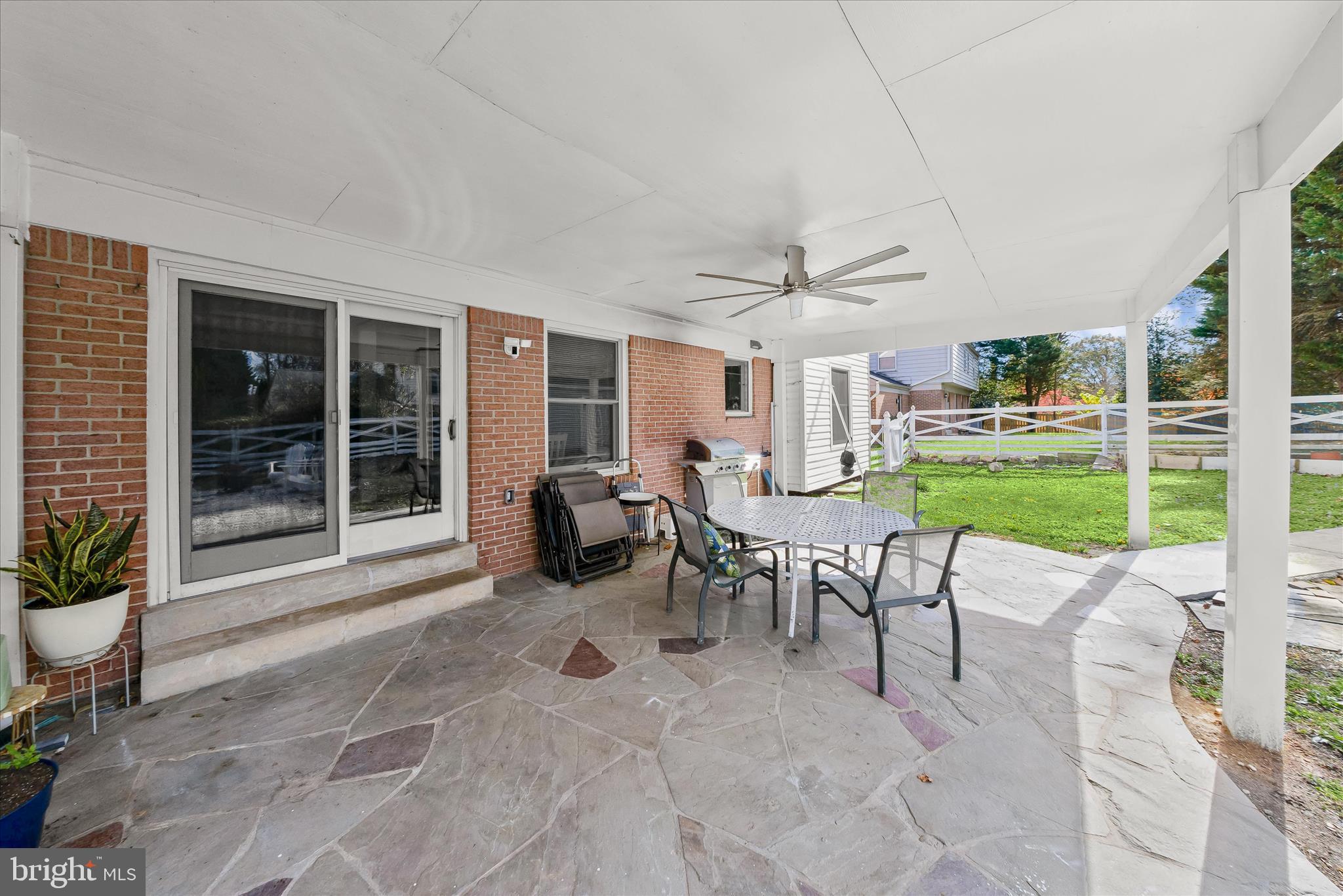 10712 Gainsborough Road Potomac, MD 20854 - Photo 43 of 53 a view of a dining room with furniture window and outdoor view