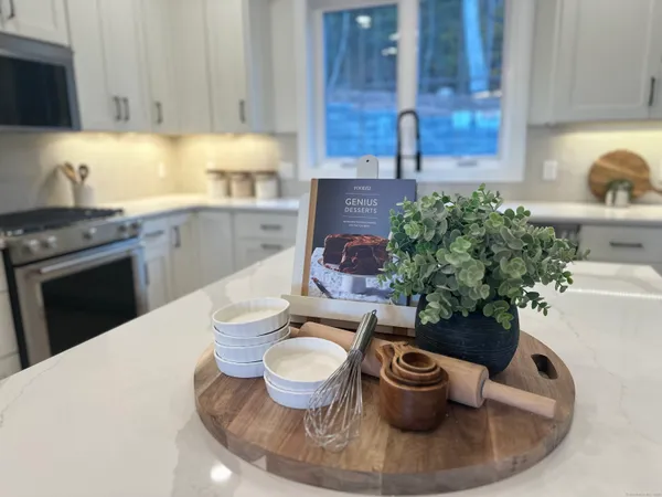 a kitchen with a stove and a sink