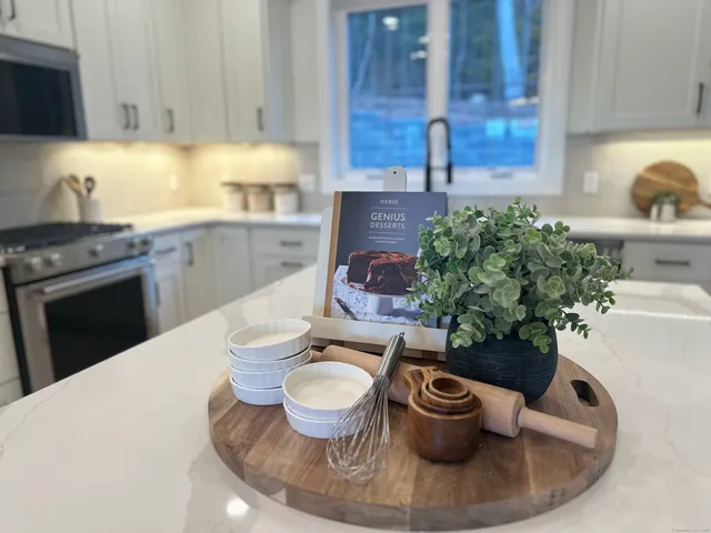 a kitchen with a stove and a sink