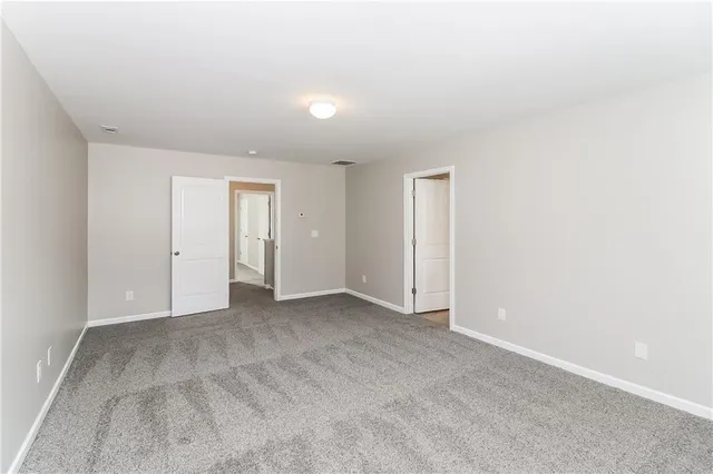 an empty room with an entryway