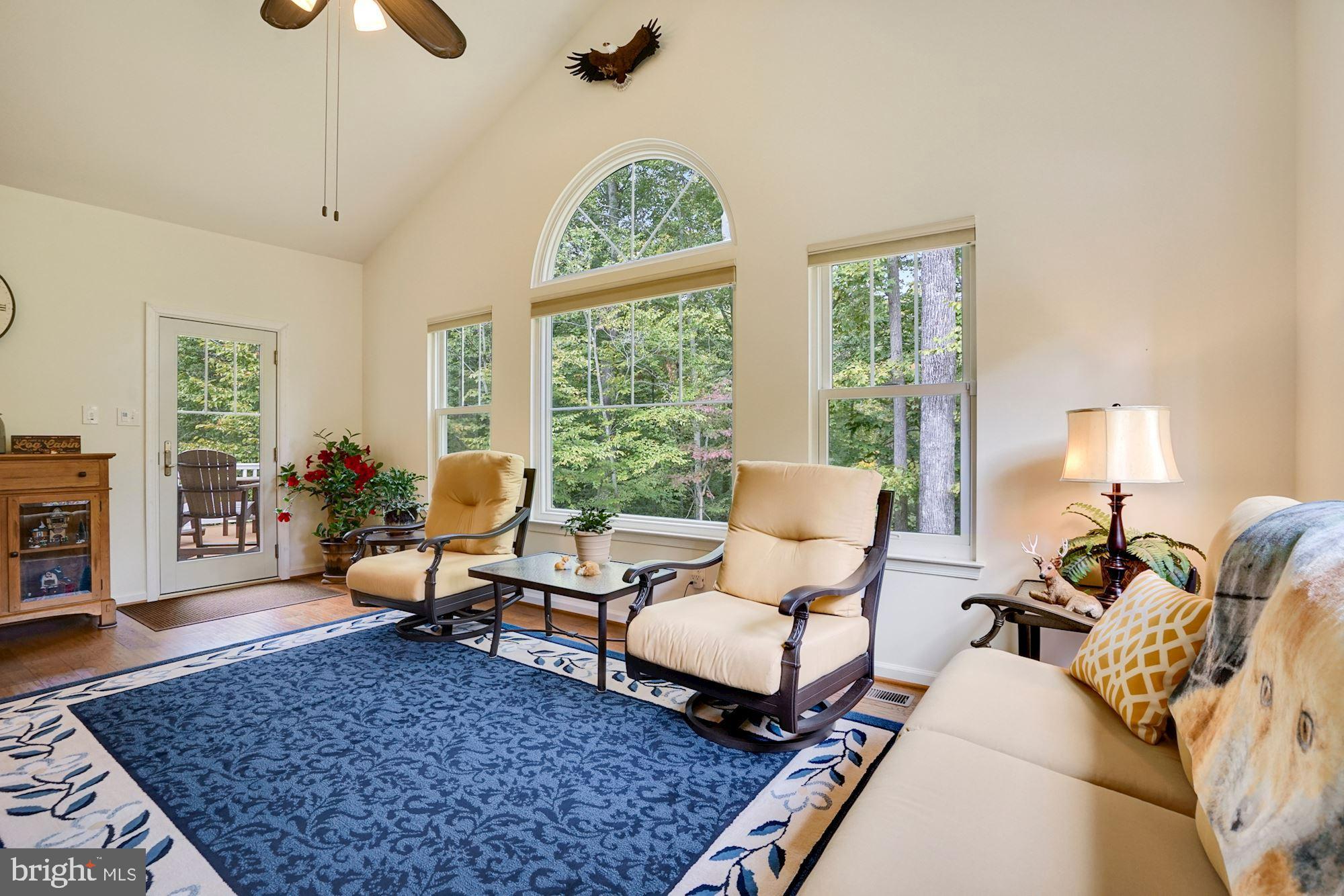 8172 Counselor Road Manassas, VA 20112 - Photo 22 of 59 Sunroom with Anderson door to deck