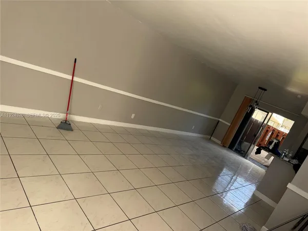 a view of a room with rack on the wall