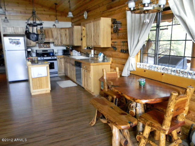 2949 Valley Forge Overgaard, AZ 85933 - Photo 8 of 20 DINING TO KITCHEN