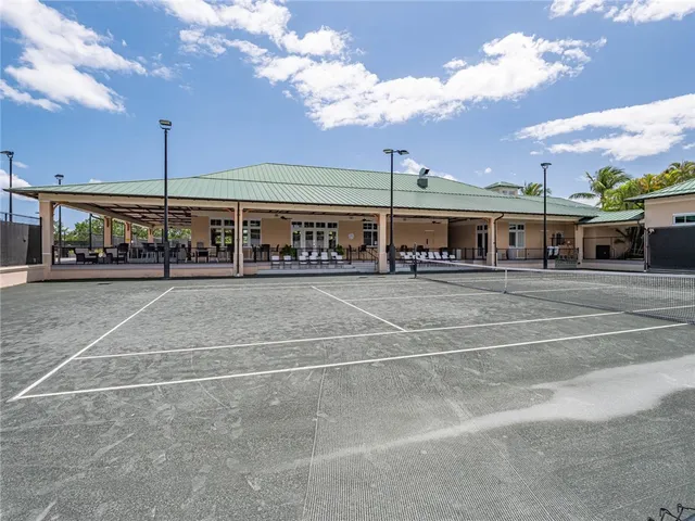 a view of a building with a car park