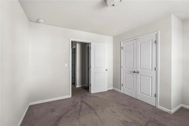 a view of a backyard of the house