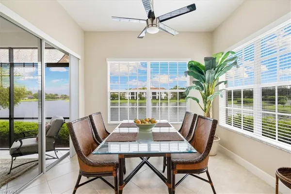 a spacious bedroom with a bed and window
