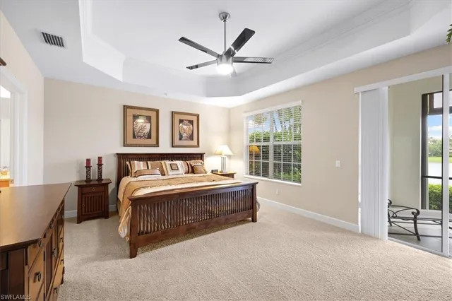 a spacious bedroom with a large bed and a large window with the outer view