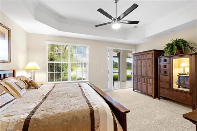 a bed room with a bed and a window