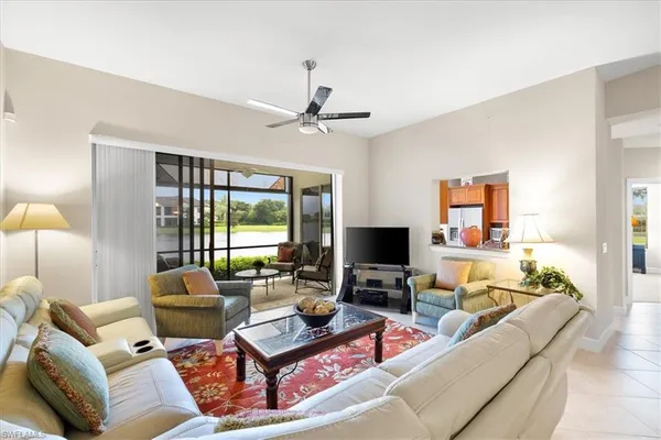 a living room with furniture and a rug