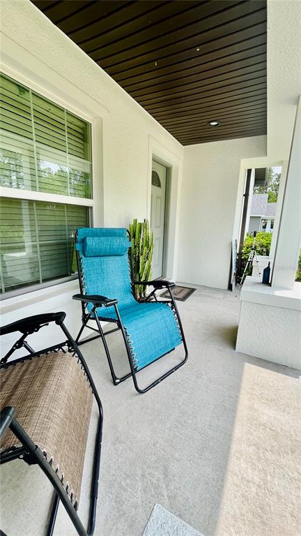 13486 English Sparrow Road Weeki Wachee, FL 34614 - Photo 5 of 51 a building outdoor space with patio furniture