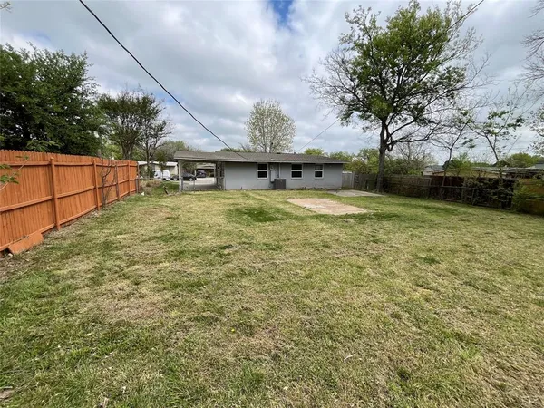 a bathroom with a sink and a yard