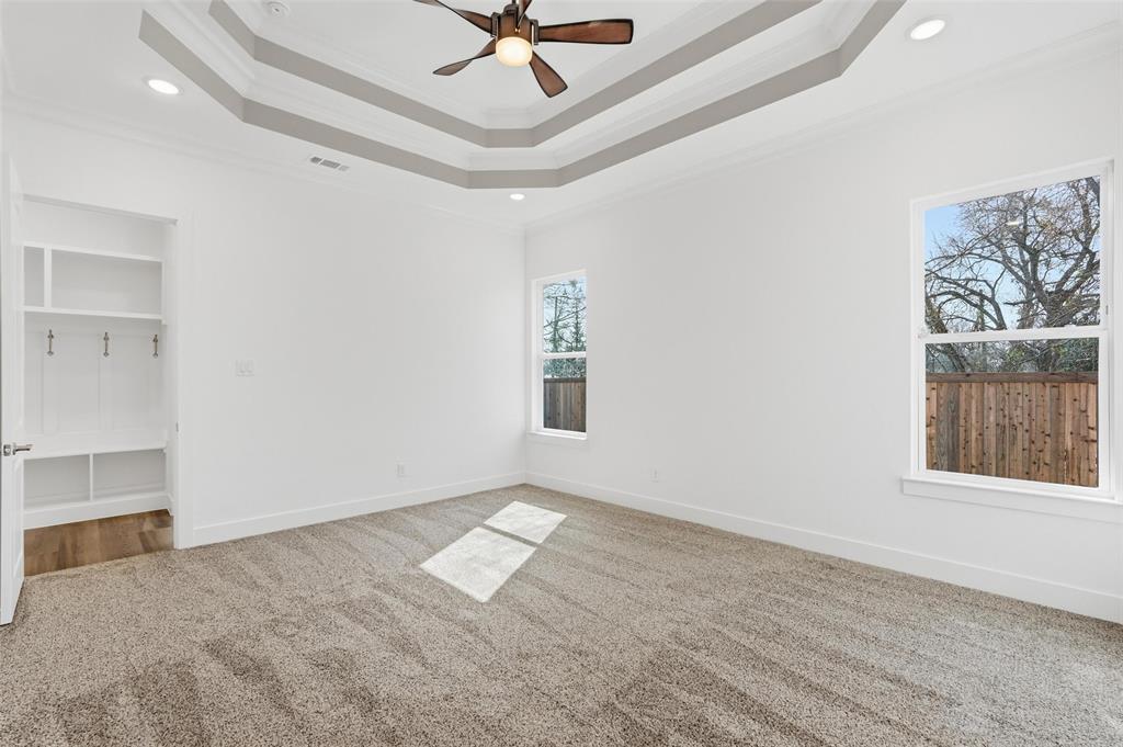 1110 Norris Street Commerce, TX 75428 - Photo 35 of 40 wooden floor in an empty room with a window