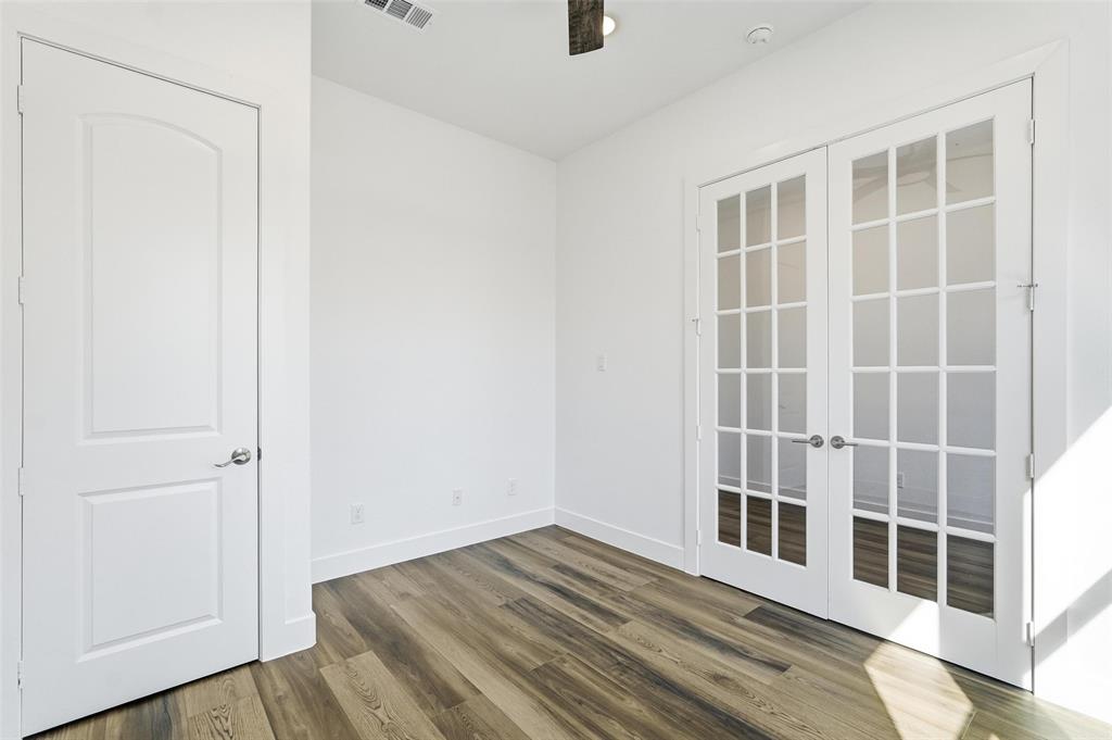 1110 Norris Street Commerce, TX 75428 - Photo 6 of 40 a view of empty room with windows