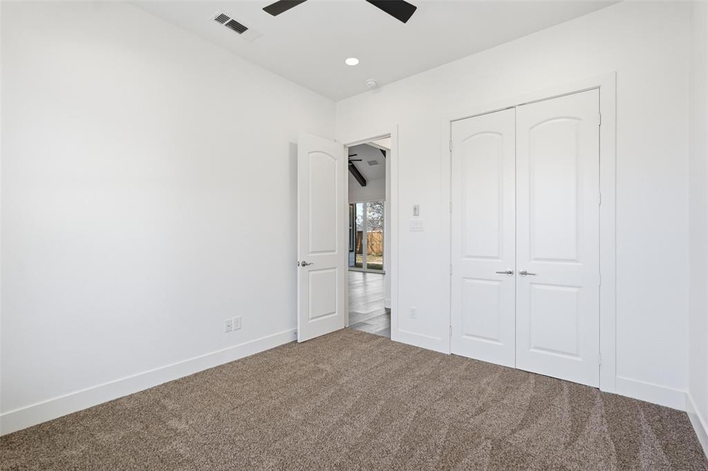 1110 Norris Street Commerce, TX 75428 - Photo 9 of 40 a view of a livingroom with wooden floor
