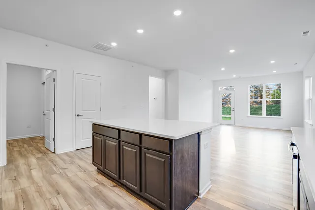 a view of a kitchen with electric appliances