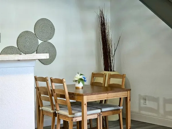 a bathroom with a sink toilet and mirror