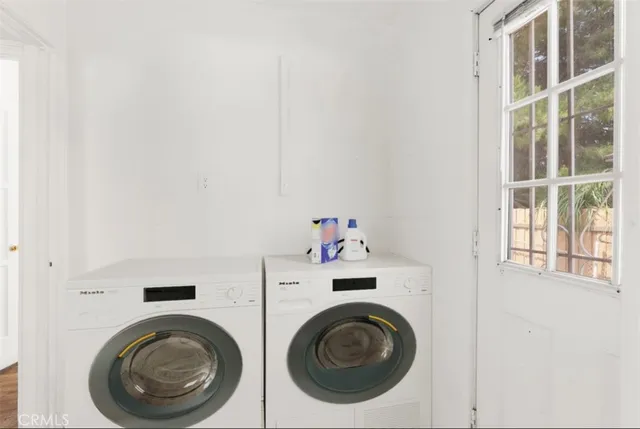 a utility room with dryer and washer
