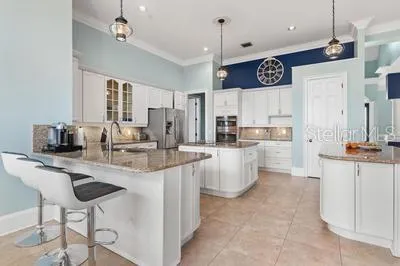 a bathroom with a tub sink shower and mirror