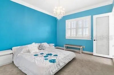 a view of a swimming pool and a yard