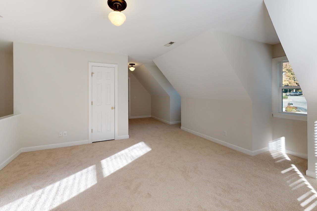 8601 Stanton Place Raleigh, NC 27615 - Photo 20 of 25 This second floor room is accessed by both the second floor hall or the back staircase. It boasts two closets and the current owners used it as a 4th bedroom. It functions well as both a bonus room or 4th bedroom. Bedroom/bonus room