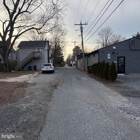a view of a house with a snow in the yard