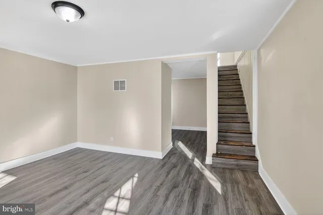 a view of entryway with wooden floor