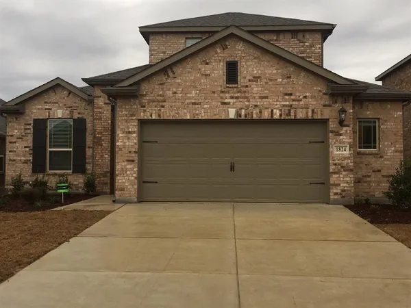 a view of a house with garage