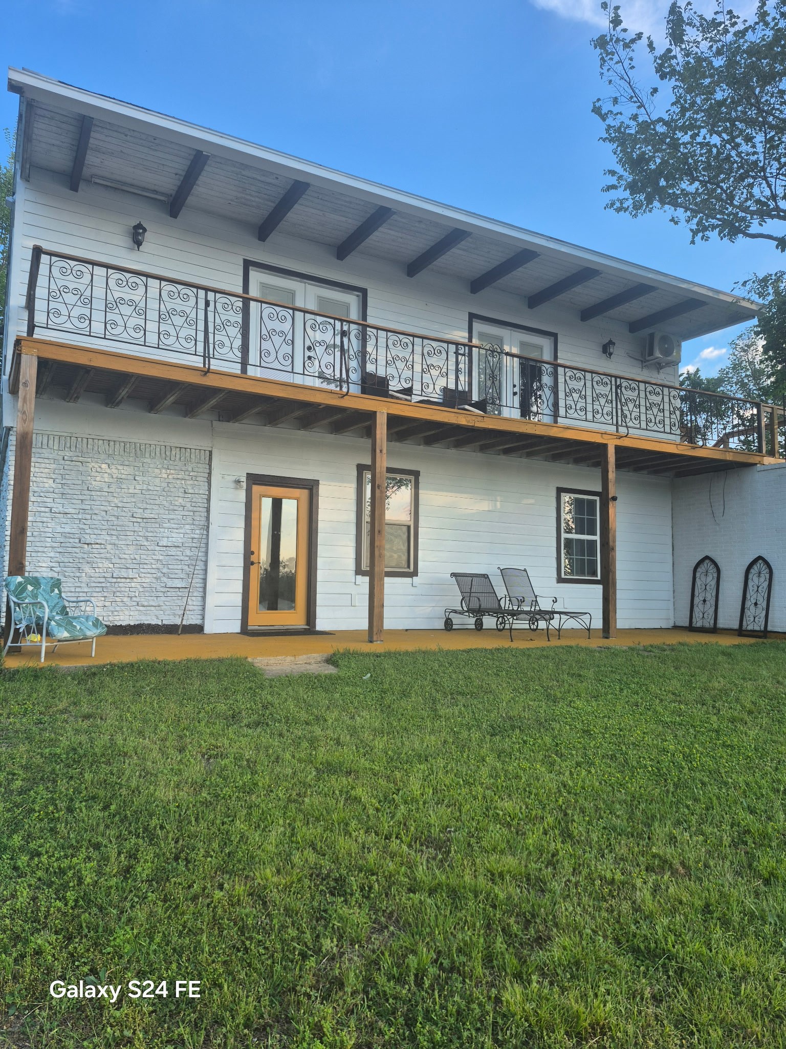 2503 River Crest, Unit 1 Houston, TX 77338 - Photo 21 of 23 a front view of a house with garden