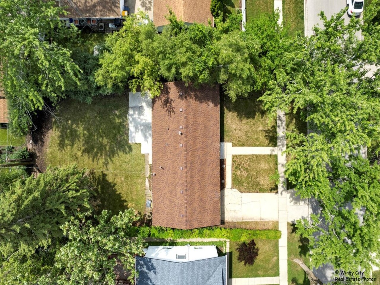 203 Elm Lane Streamwood, IL 60107 - Photo 18 of 23 an aerial view of a house with a yard