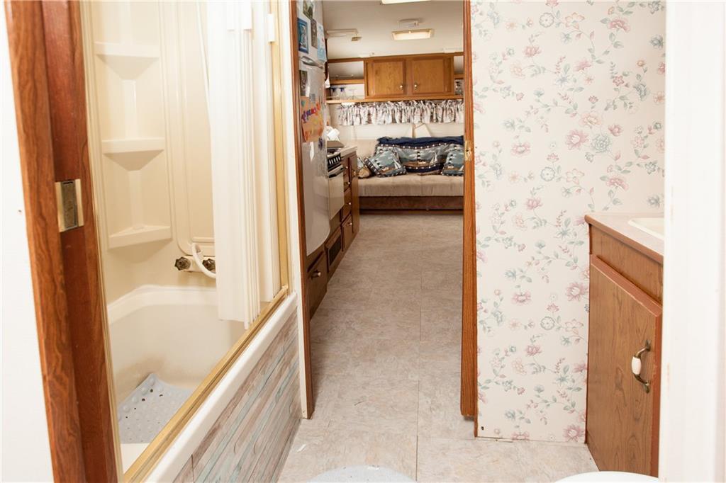 333 Long Sands Road, Unit 22T York, ME 03909 - Photo 8 of 20 The 3/4 bath is tucked between the...